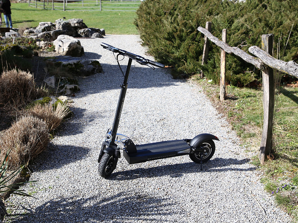 City Scooter From Hikerboy City light electric scooter on cobbled stone